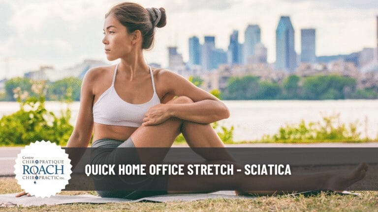 woman sitting outside on a blanket performing Seated Piriformis Stretch to help with sciatica pain