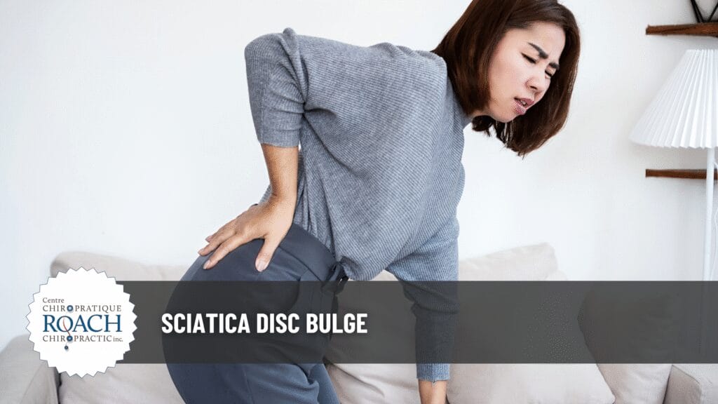 a woman holding her sciatic nerve area experiencing sciatica disc bulge.