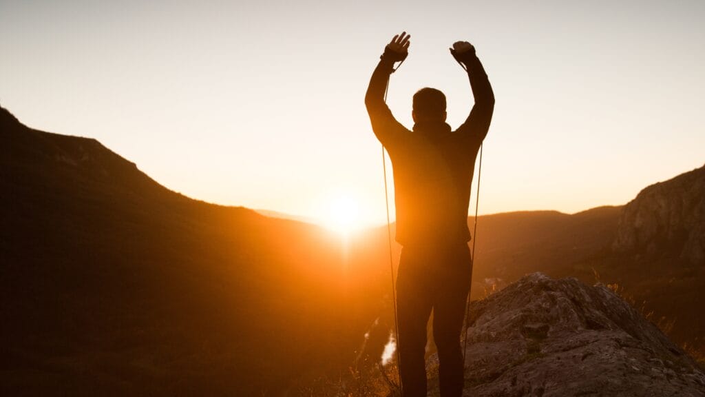 a person exercising while out for a run, keeping motivated with tips learned through chiropractic care.
