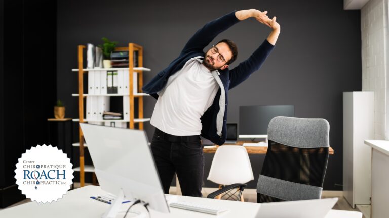 A man taking a break from work to stretch