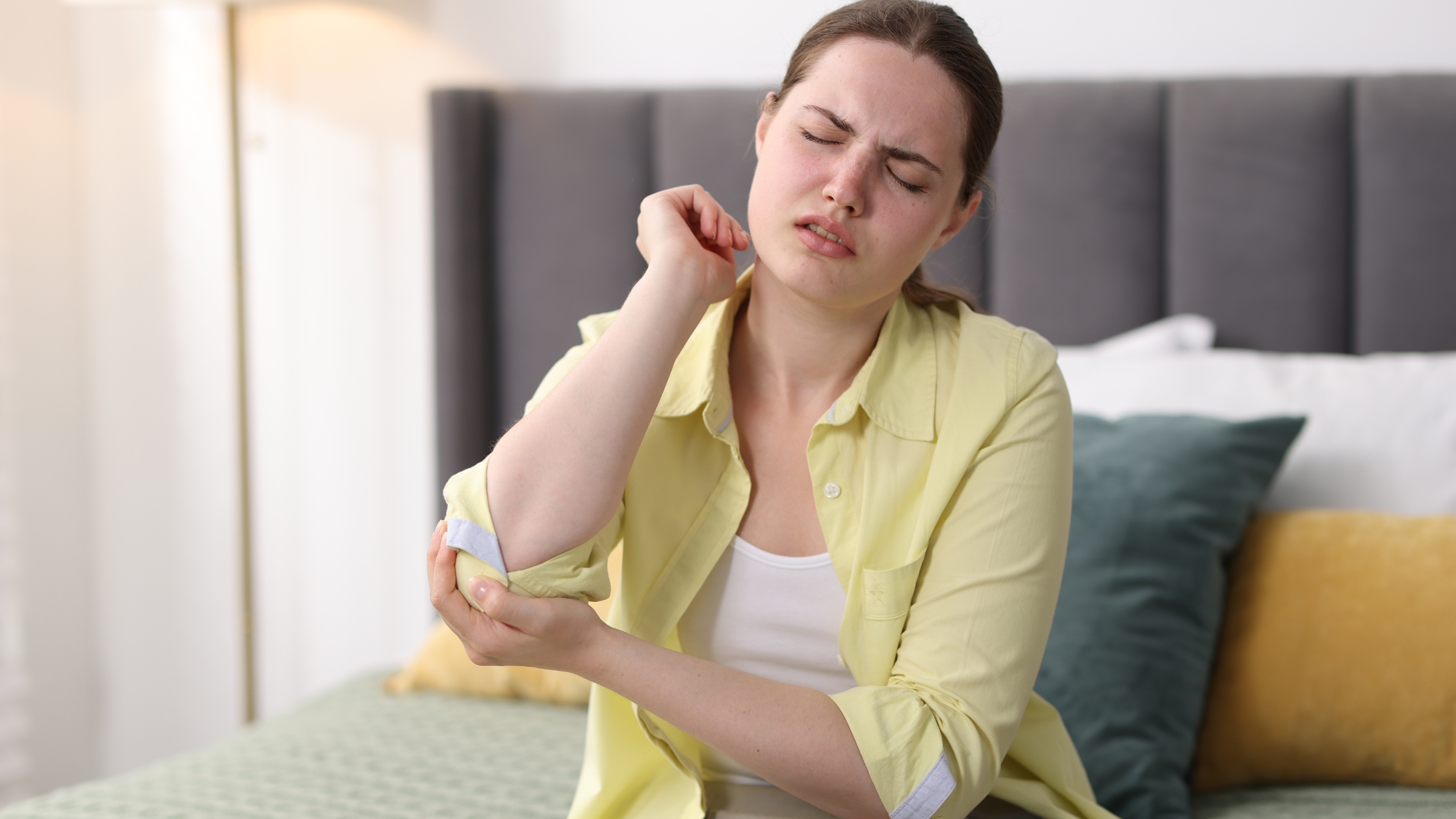 a woman with chronic pain in her join